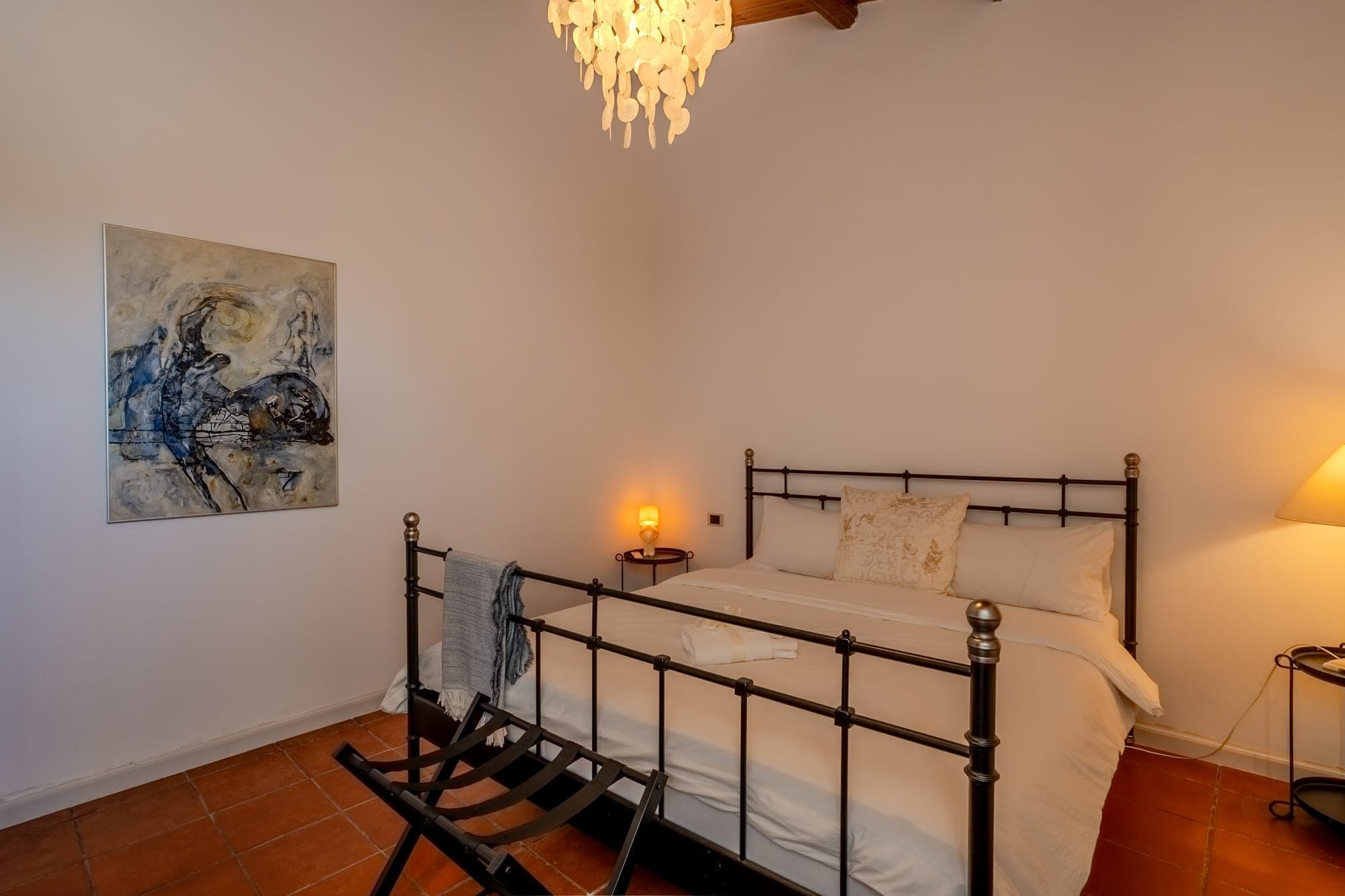 Bedroom with artistic details and warm ambiance