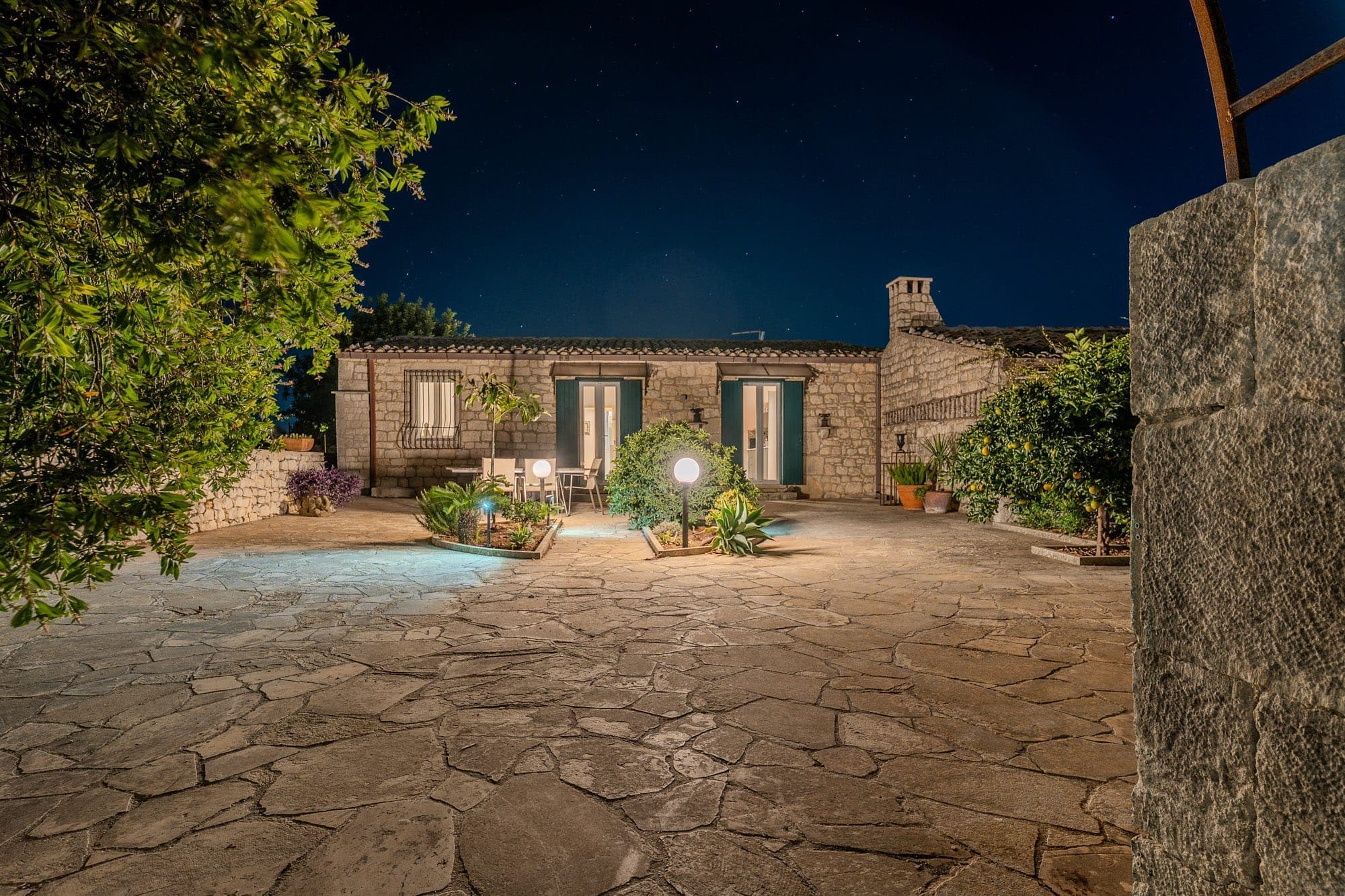 Entrance courtyard illuminated at night